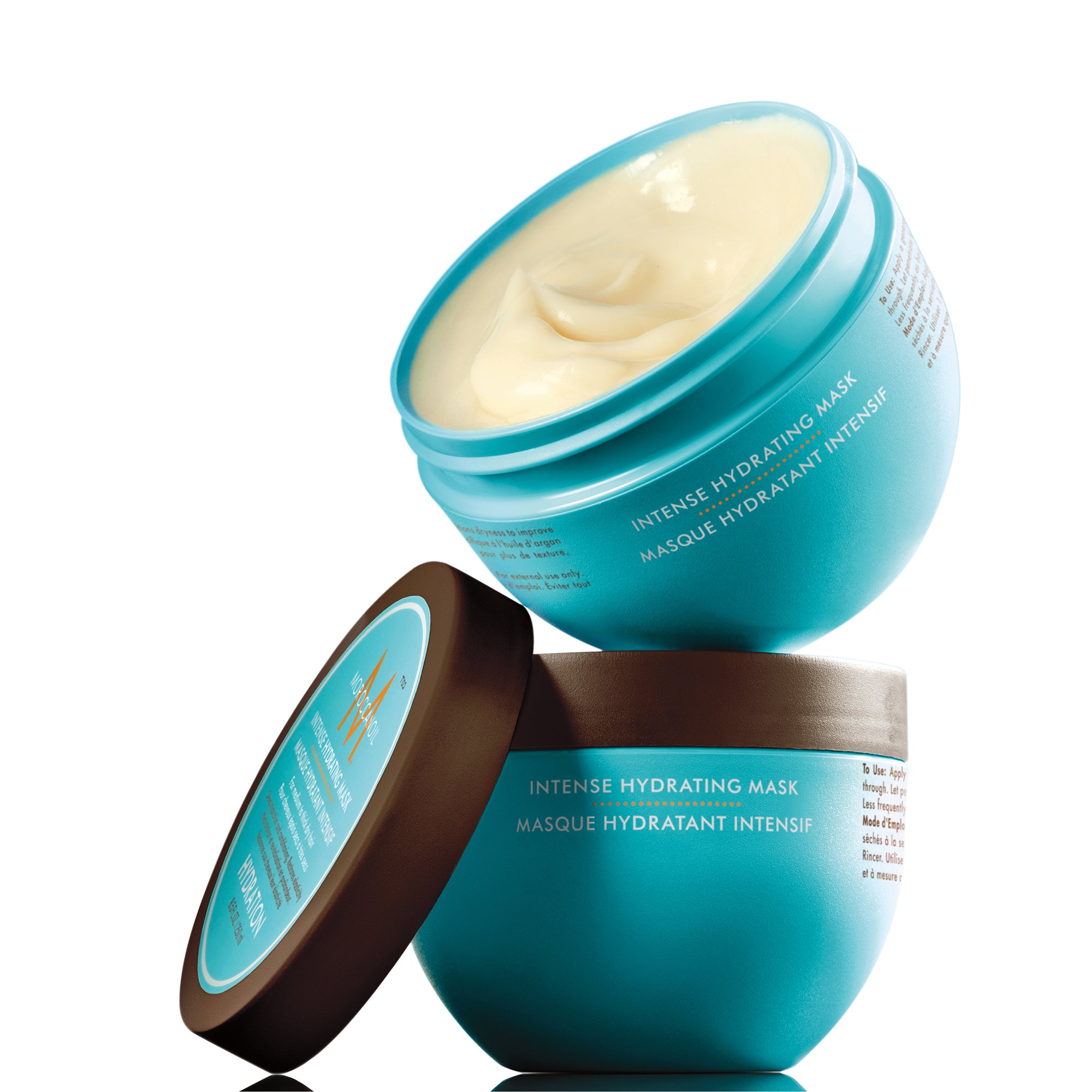 Two blue containers of intense hydrating mask on a white background