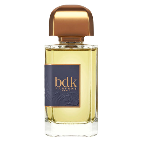 Perfume bottle with gold cap and 'bdk Parfums' label on a white background