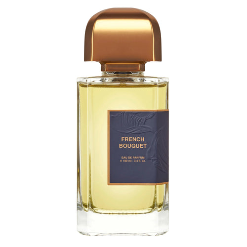 Perfume bottle labeled 'French Bouquet' with a gold cap on a white background