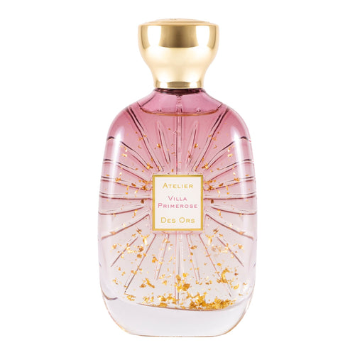 Pink perfume bottle with gold cap and label on a white background