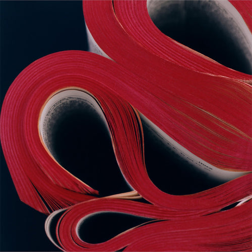 Red tape roll on a black background