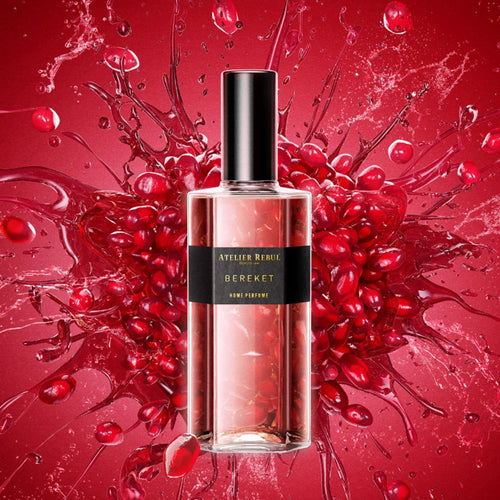 Perfume bottle with pomegranate elements on a red background