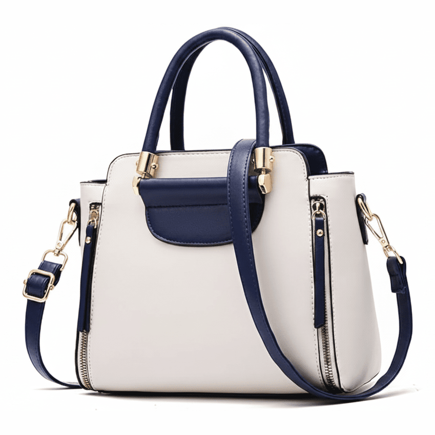 Women's cream and navy blue leather top handle satchel shoulder bag with gold hardware