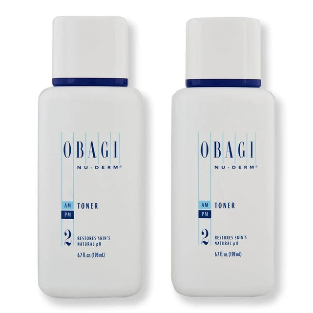 Two bottles of Obagi Nu-Derm AM Toner on a white background